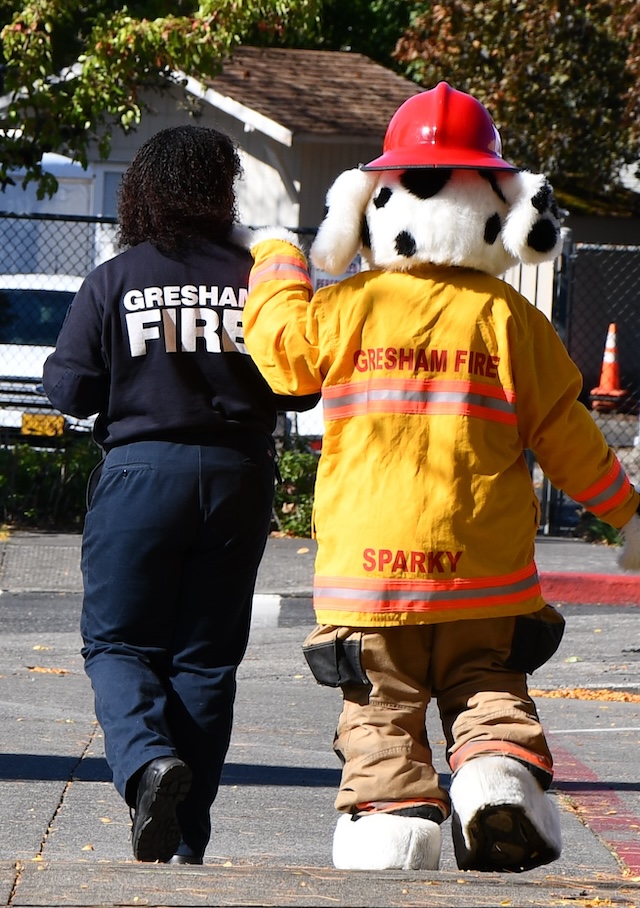 Person walking with mascot