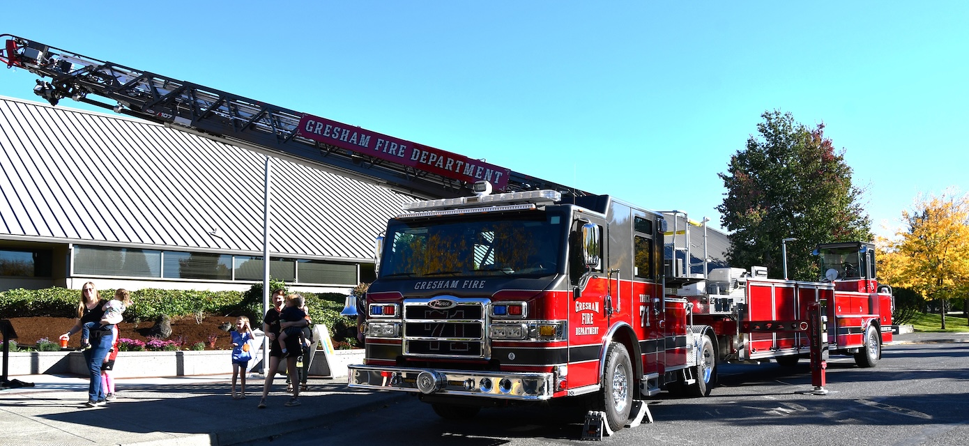 Fire engine 71 parked outside building.