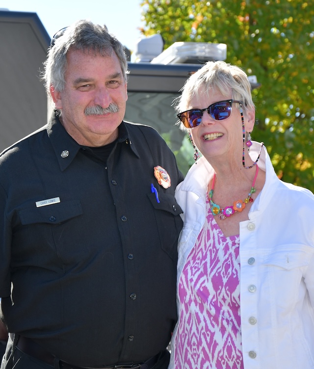 Man and woman posing for picture together