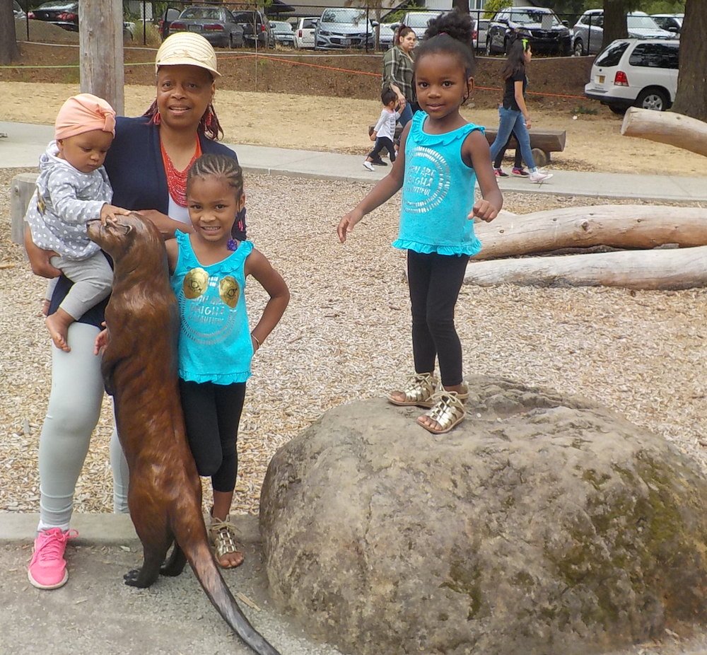 Vanessa Chambers and her grandchildren with Slider.